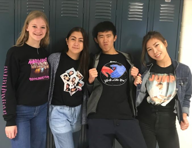 Juniors Lois De Heer, Paulina Leon, Taichi Karikoma, and Ngai Ching Wong (Gladys) pose in their Maroon 5 shirts, which they purchased at the Sept. 22 concert.