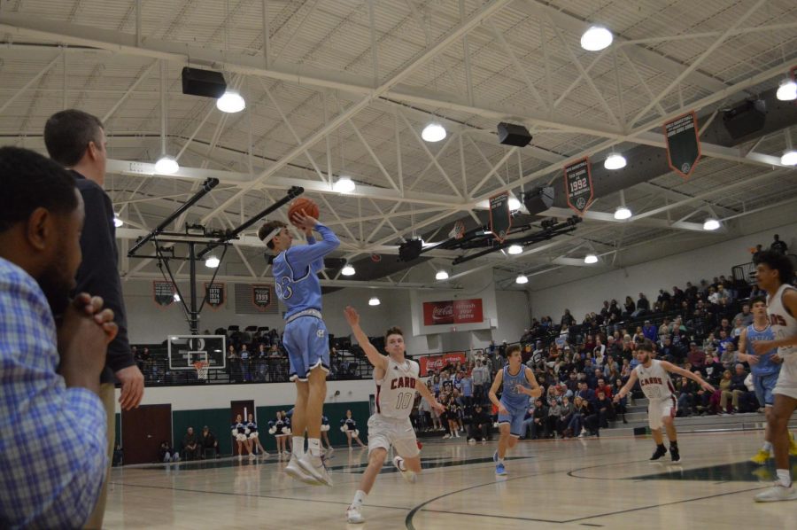 Senior Jack Kisselbaugh shoots a three during the 3rd quarter against Taylor County in 5th Region play at Hart County High School on Feb. 25.