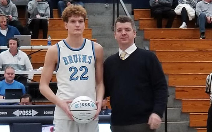 Pictured+with+head+coach+Matt+Nickell%2C+senior+Jacob+Hobbs+was+recognized+before+the+game+on+Feb.+7+for+scoring+his+1%2C000th+point+against+Fort+Knox+in+January.