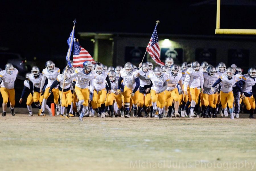 Bruin Football Players Give Back To Community This Thanksgiving