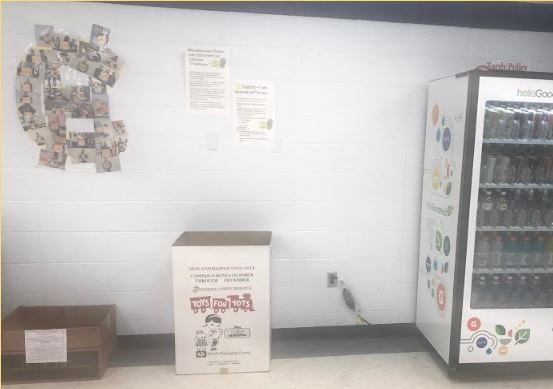 The Thanksgiving Food Drive box and Toys for Tots box are located in the Commons Area beside the vending machine.