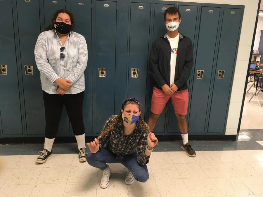 Seniors smile behind their mask as they kick off their last Football Homecoming Spirit week!