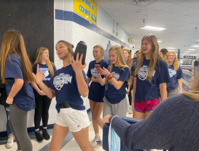 Seniors Lauren Thompson, Brooke Mcelfresh, Lindsey Vest, and Lily Padgett are recognized as they walk through the halls before their game against Montgomery County (Nov. 11)
