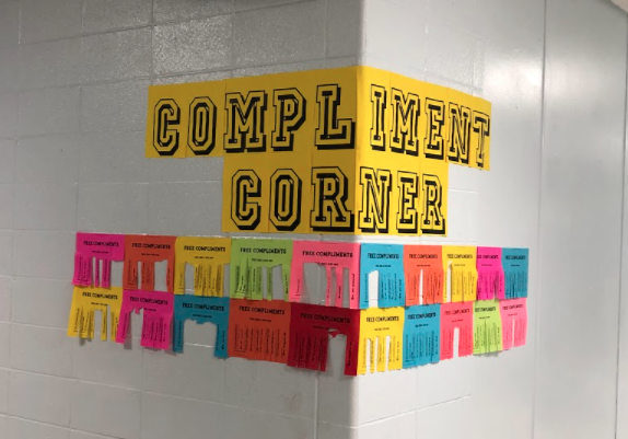 Want to be kind and need some inspiration? Check out the Compliment Corner outside of Room 123, created by English teacher Lyndsay Booth. I just wanted to add a little bit more positivity and kindness into the school, even in a small way, Booth said. 