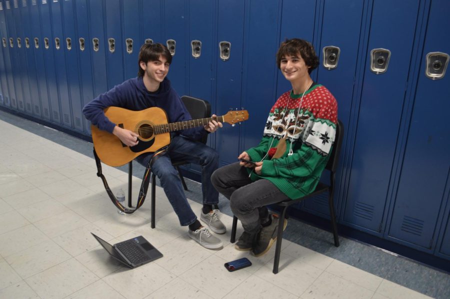 Seniors Tristan L. and Alex A. practicing guitar (Dec. 16).