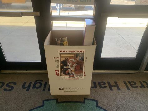 Toys For Tots donation box located inside the attendance office.