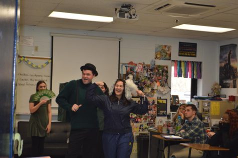 Junior Garrett Milby (tortoise) and sophomore Kodiak Hinton (hare) perform in On Your Mark, one of the 10-Minute Musicals produced by the Drama Club this year, in Betsy Hobbss 3rd Block Honors English III class on March 16.