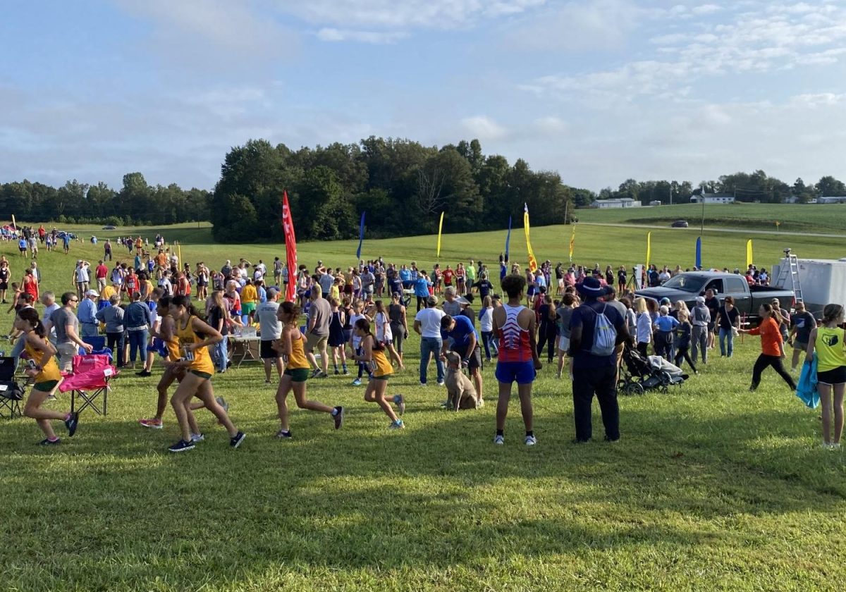 Athletes running at the Fairground Frenzy Cross Country Meet early Sat. morning (Sept. 9).