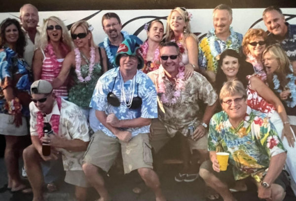 Family and consumer sciences teacher Jo Million and her fellow Parrotheads dressed and ready to see Buffett perform. 