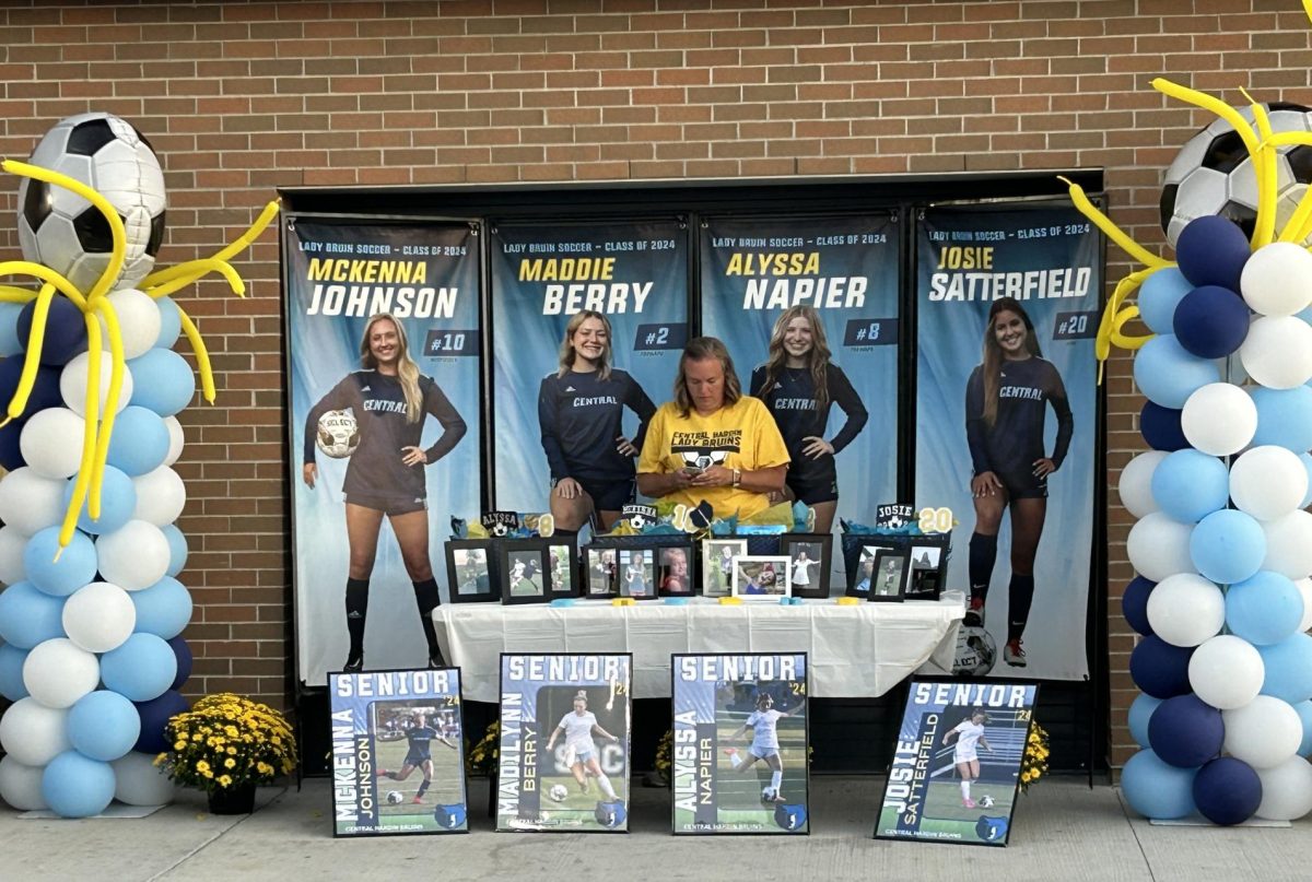 A Bruin soccer parent organizes the Senior Night display for Makenna Johnson, Maddie Berry, Alyssa Napier, and Josie Satterfield on Sept. 25, when the Bruins defeated Holy Cross 7-0. Unfortunately, The Central Times staff didnt get the memo that the Varsity game time changed from 7:30 to 6:00 and missed a photo opportunity of these veteran players.