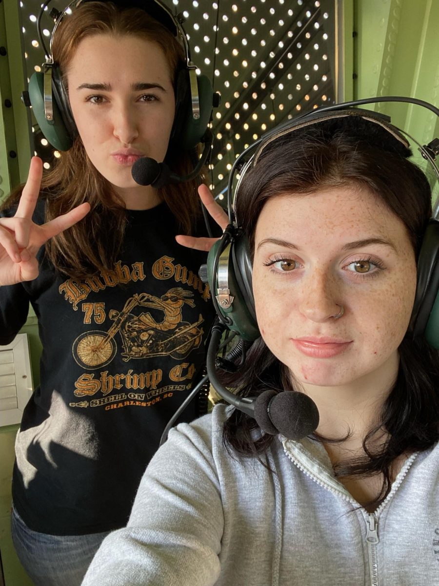 Seniors Sydney Higdon and Megan Puckett had the opportunity to try on the military headset. (Nov 9)