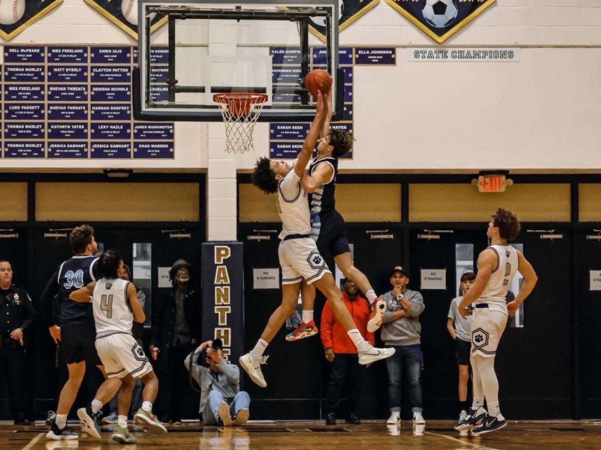 As a junior, now senior Ace Jaggers was named to the All-District and All-Region teams. In a 2022-2023 match-up, Jaggers goes for a dunk over senior Ayden Evans.