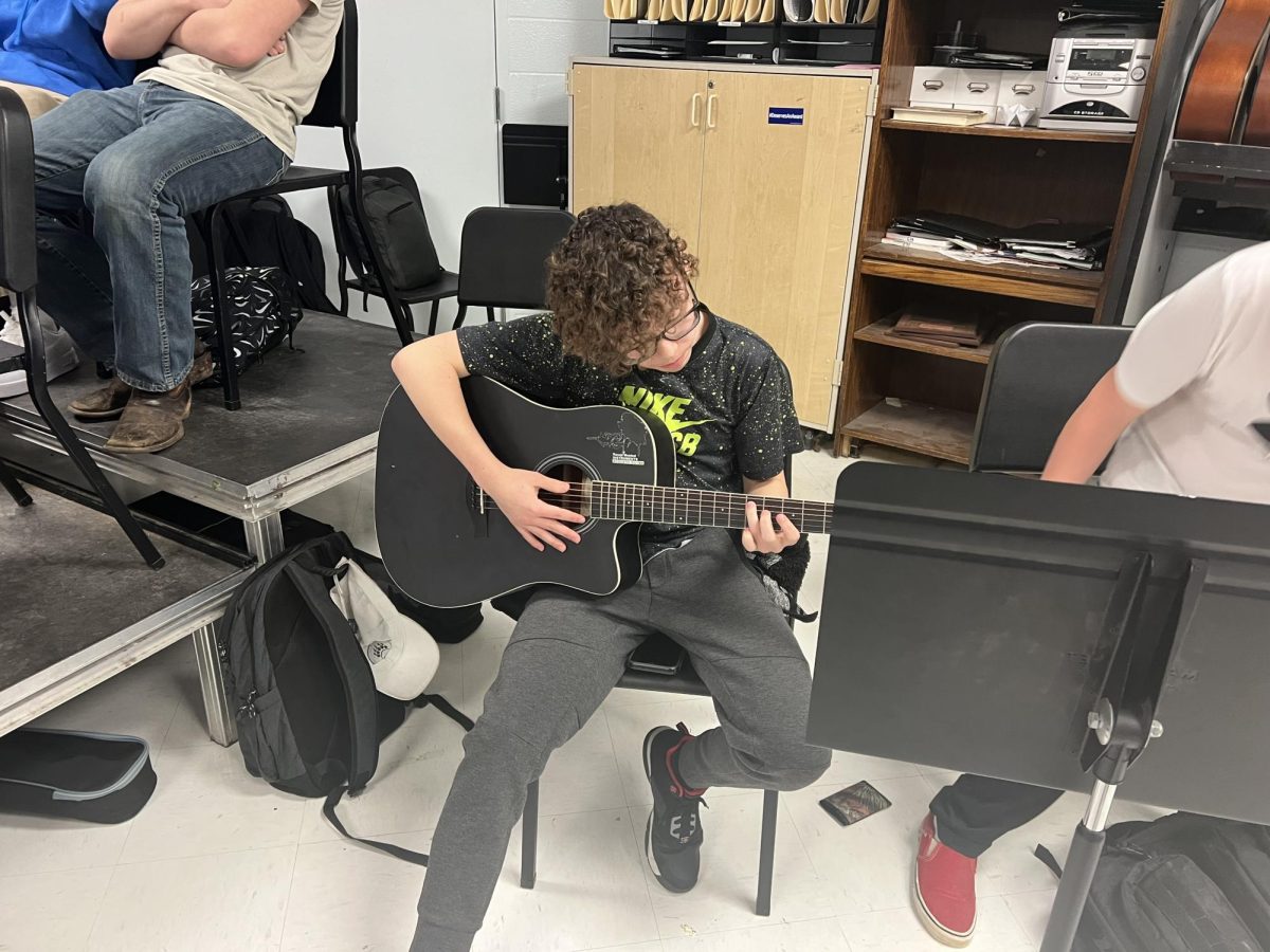 Freshman Michael Leslie has mastered the guitar through music teacher Brandon Centers third block guitar elective class. Central Hardin offers a plethora of guitar, piano, choir, and band classes. (Feb. 27)