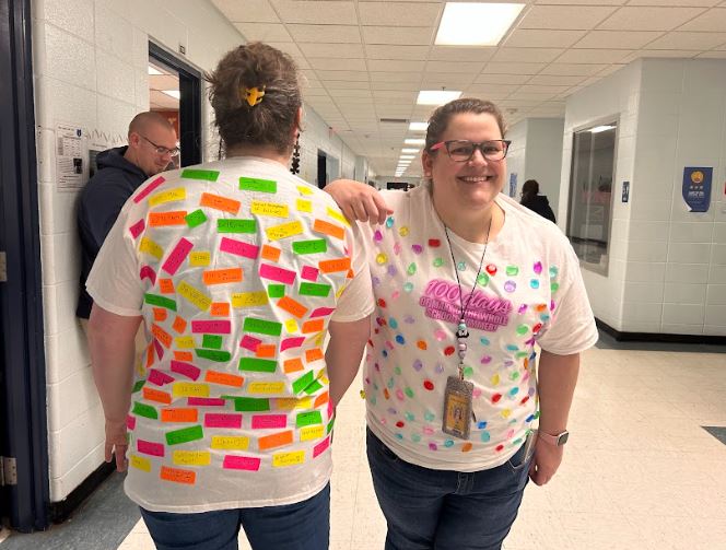 Math teacher April York and history teacher Emily Wortham created t-shirts for the 100th Day of School decorating contest that took place on Feb. 2. These two are both CHHS alumni and have been friends for nearly 20 years. Worthams shirt is an ode to the Taylor Swift song, bejeweled while York displays 100 different math equations.