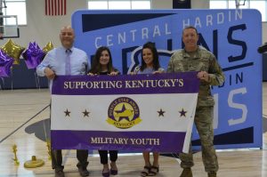 Principal Time Issacs, YSC Counselor Brendan Chaney, YSC Counselor Amanda Sanders, and Major Jonathan Fairbanks hold the Purple Star Award banner. This Award represents Centrals commitment to our military youth and families. (Apr. 17)
