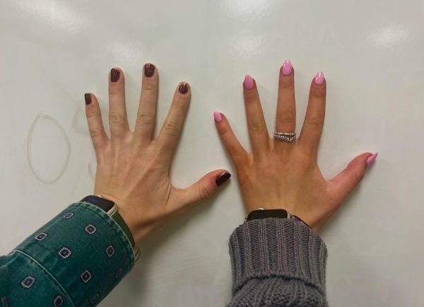 A comparison of a natural hand and a self-tanned hand. Often times, you can tell if someone has self-tanned by the drastic white creases in-between the fingers. (Mar. 13)