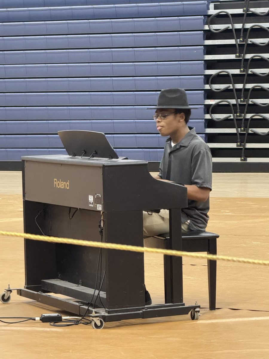 Junior Isaiah Washington tickles the ivories as the first act (Blame it on the Boogie by Michael Jackson) in the 2024 Talent Show (May 14).