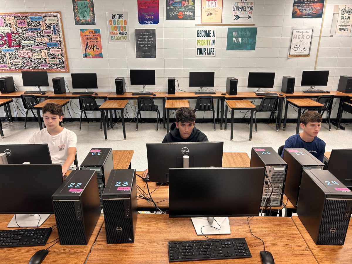 Rising freshmen Jack Mann, Santi McNeil, and Josiah Bennett work on the online Health class to get a head start on their high school credits at Summer School on June 14. Almost 200 students took advantage of the opportunity to take Health during the June 3-14 Summer School period.