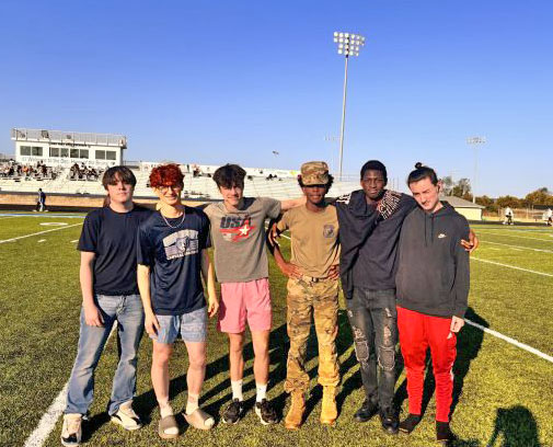 Seniors Landon Lane, Braxton Booth, Dominic Komlos, Jaden Gavin, Darron Dalton, and Isaiah Hornback take a break from playing football to pose for a picture at senior recess. Senior recess was a nice way to  give students a chance to feel like a kid again. (Sept. 5)