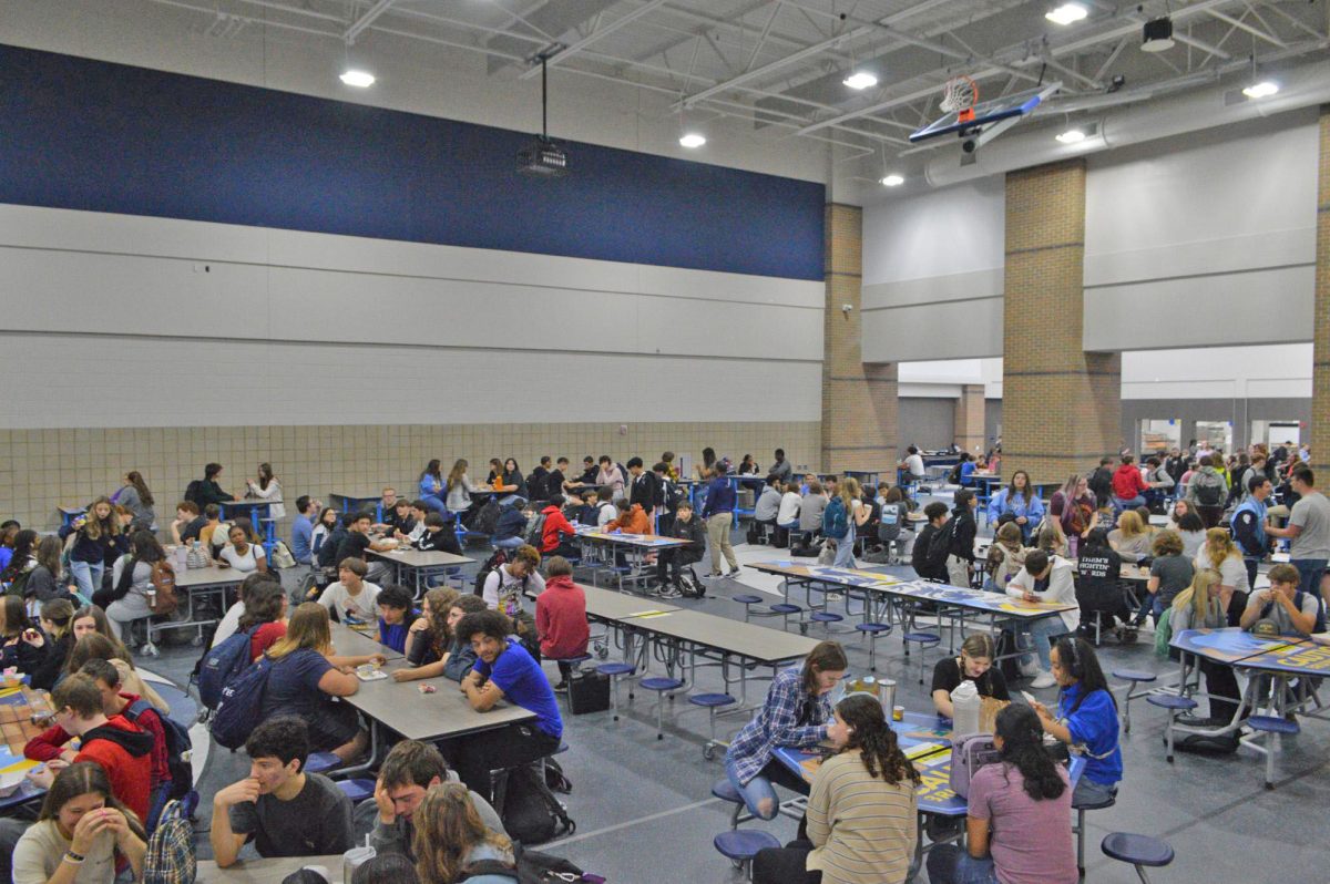 Students enjoy the new cafeteria on Sept. 3 after  waiting since the start of the year. The new cafeteria is a breath of fresh air from the old, bland one we sat in.