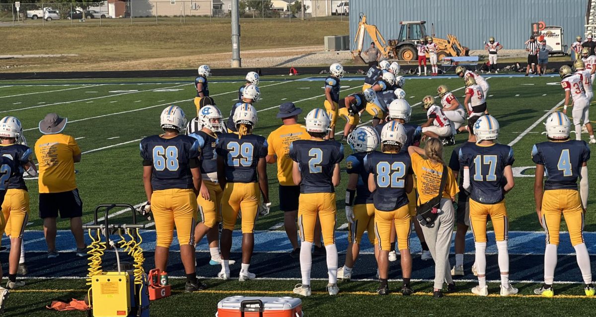 The JV football team lines up on the field for their game against the Daviess County Panthers (Sept. 16)