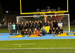 The boys' soccer team celebrates their 1-0 overtime win over E-town to capture the 5th Region title on Oct. 16. The boys will play the winner of the 7th Region (TBD) on Oct. 21 at Central Hardin.