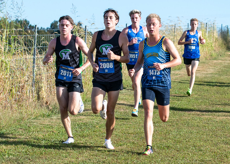 Senior Jared Fairbanks battles for his Region Runner-Up placement at the Region 2 meet on Oct. 26. He enjoys his rivalry between other high-performing players, and his competitive spirit fueled his attainment of the school record in the 5k in August. (Courtesy of the Central Hardin Cross-Country Team)