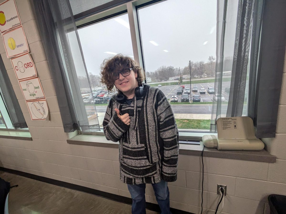 Sophomore William Grimes stands in front of the window for the first snow this season on Nov. 21st. It may not stick to the ground this time but let's hope it will next time.