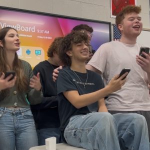 Samantha Dougherty's AP Calculus class spread Christmas cheer with the carol "The Twelve Days of Calcmas" on Dec. 20. Seniors Ethan Watkins and Landon Slinker lead the group with wide smiles after eating Calcmas cake and making calculus ornaments. 