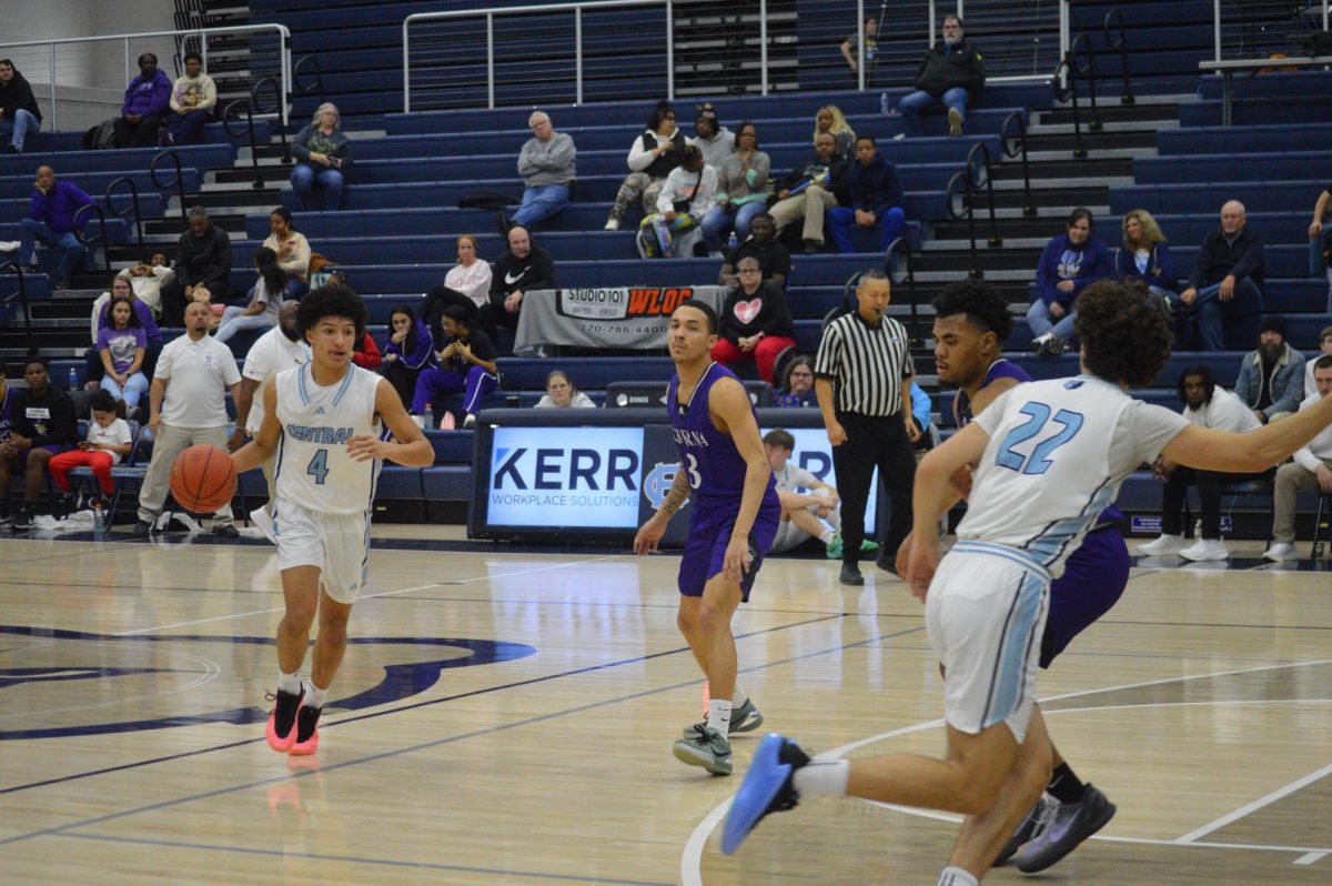 Junior Camdyn Hogan mid-dribble during Central’s homecoming game against Caverna on Feb. 14
