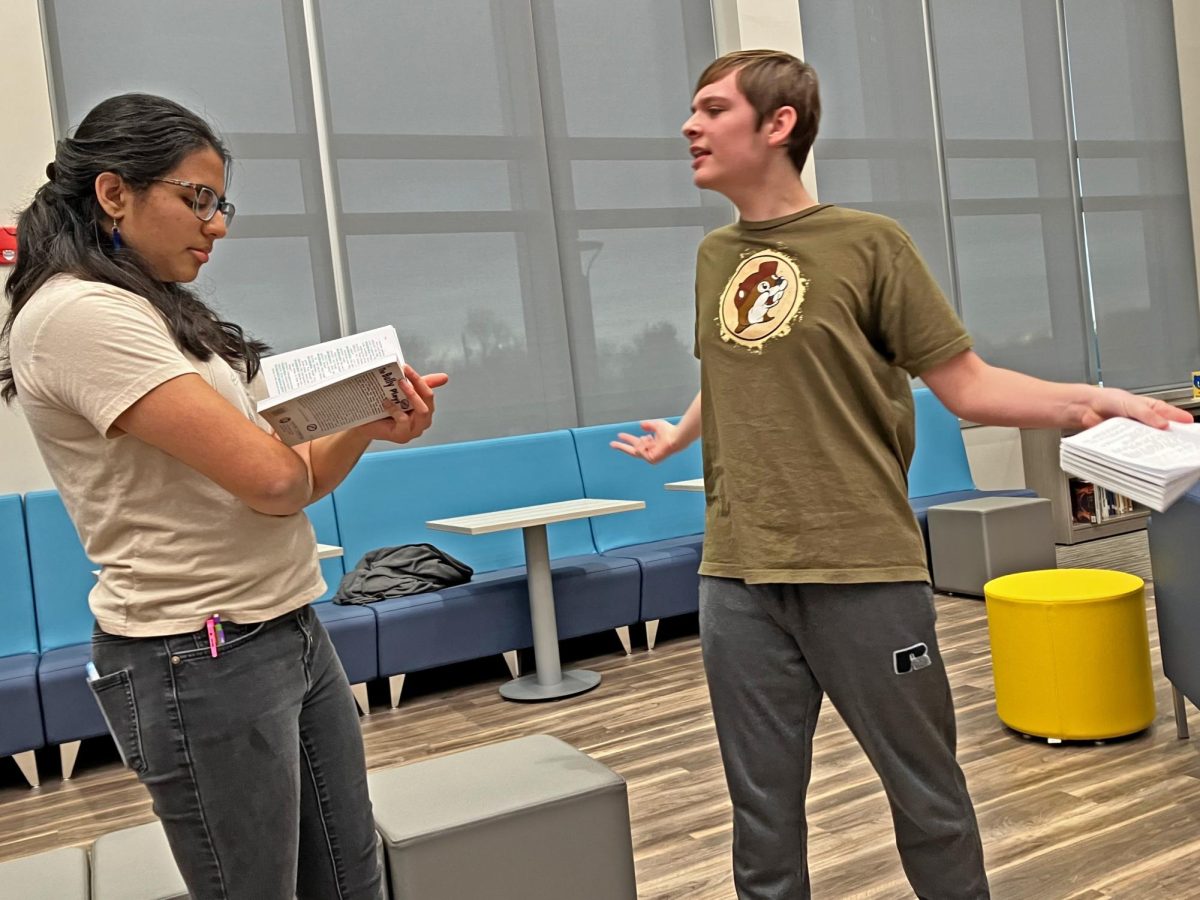 Krusha Patel and Eli McGraw rehearse  "The Bully Pulpit" by Dwayne Hartford. This play is important due to the everlasting problems with bullying. 