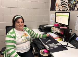 School nurse Heather Kennedy takes a brief break in the middle of a busy day. As the sole nurse for the sophomores, juniors, and seniors, Kennedy serves almost 1,500 students, sometimes 25 per day.